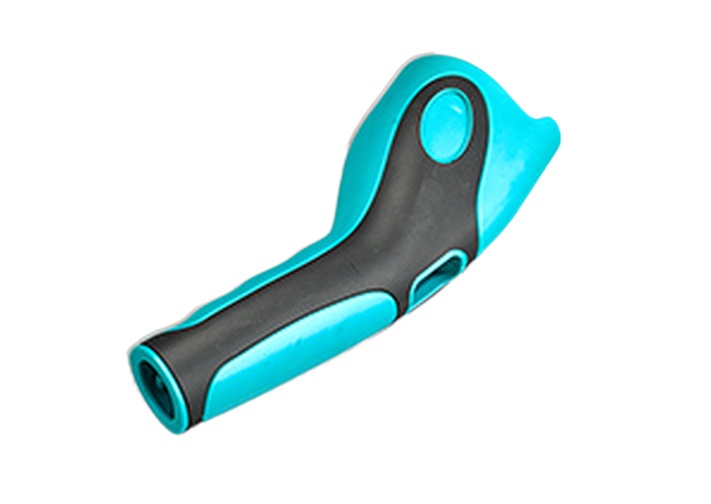 Overmolding process showing soft TPE layer molded over rigid plastic substrate
