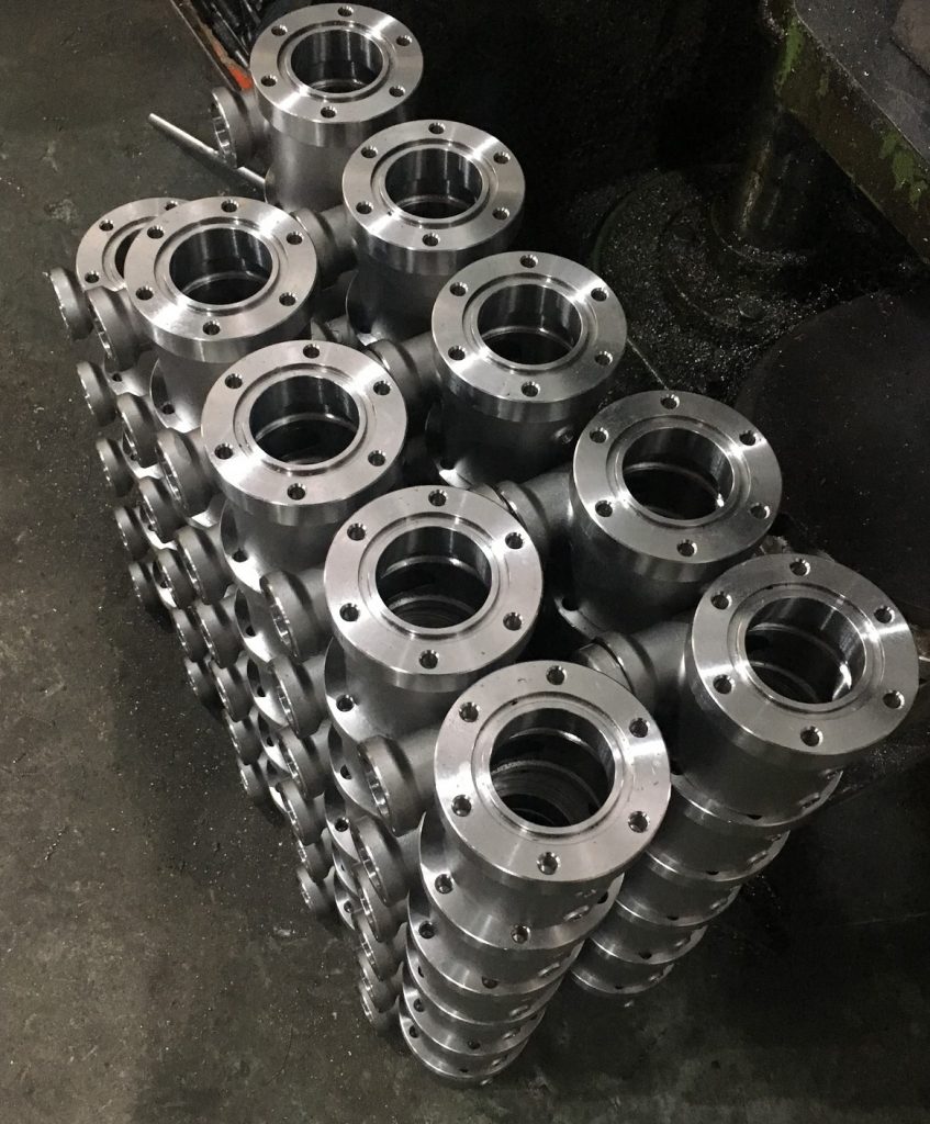 CNC machining production volume showing cost-per-unit reduction from 1 piece to batch orders of 10 or more