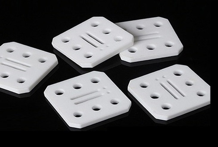Bearing-grade PTFE CNC machined bushings, thrust washers and slide plates